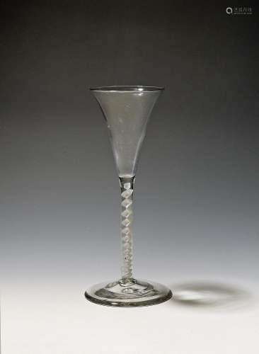 A toasting glass or wine glute c.1760-70, the slender drawn ...