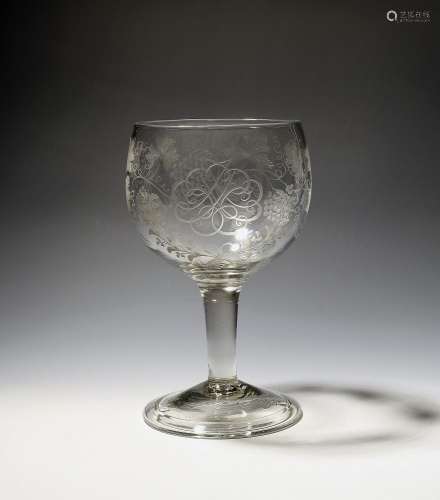 A large ceremonial goblet c.1750, the cup-shaped bowl engrav...
