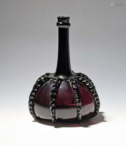 A Dutch amethyst glass decanter or bottle c.1760, the flatte...