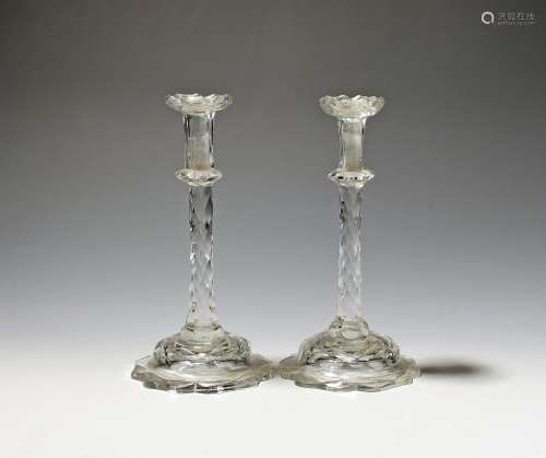 A pair of cut glass tapersticks c.1790, the slender faceted ...