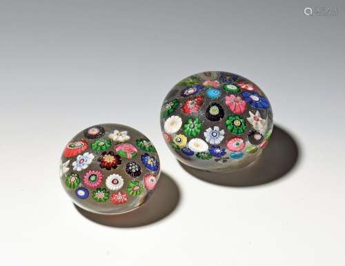 Two Clichy spaced paperweights c.1850, the smaller set with ...