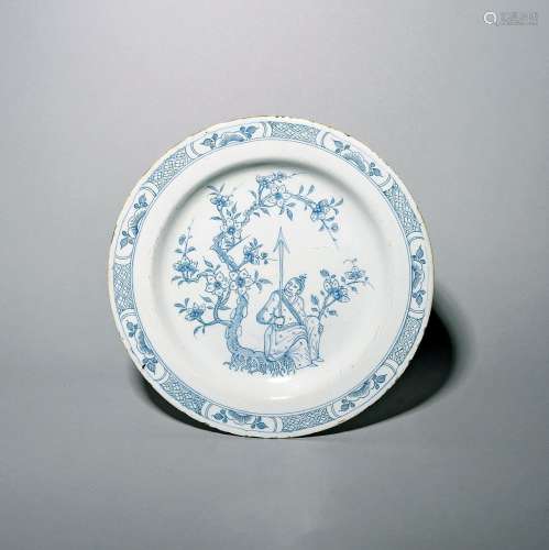 A large delftware plate c.1760-70, probably Bristol or Liver...