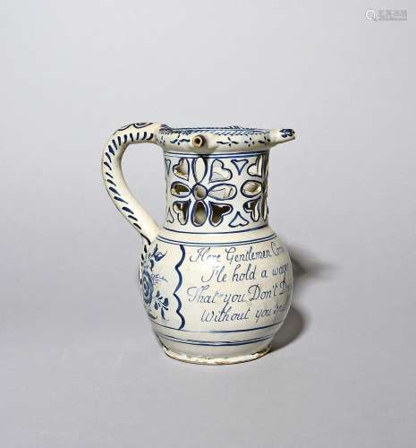 A delftware puzzle jug c.1740-60, probably Lambeth, the roun...