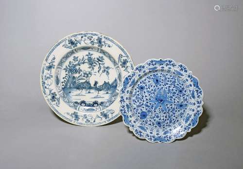 A Liverpool delftware plate c.1740-50, the well painted in b...