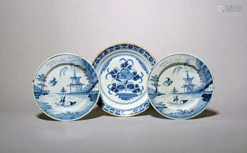 A pair of small delftware plates c.1720-40, each painted in ...