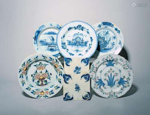 Five delftware plates 18th century, three painted in blue va...