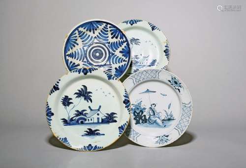 Four delftware plates .1720-80, a pair of pancake form and p...