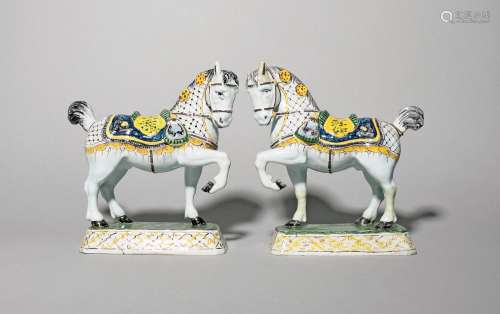 A pair of Delft figures of horses 19th century, each modelle...