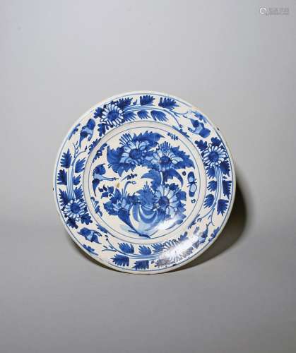 A Delft charger late 17th century, painted in blue with inse...