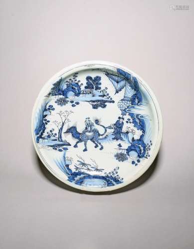 A large Delft circular dish c.1690-1700, decorated in blue a...