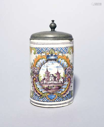 A German faïence pewter-mounted tankard dated 1778, the cyli...