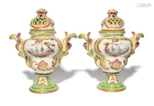 A pair of faïence vases and covers of Veuve Perrin style pro...