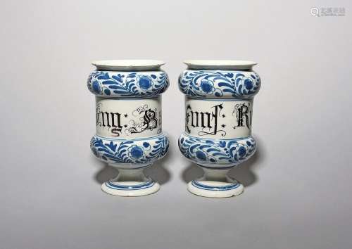 Two Savona maiolica drug jars or albarelli c.1760, of dumbbe...