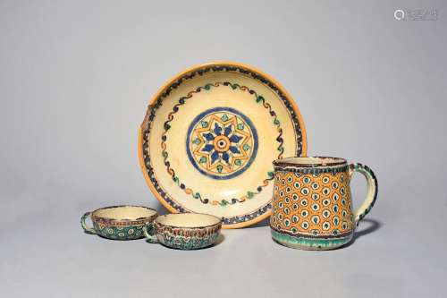 A pair of Tunisian pottery shallow cups and a jug 1st half 2...