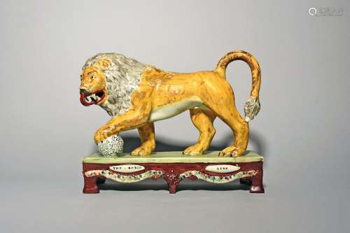 A large Staffordshire model of a Medici lion c.1825, of Obad...