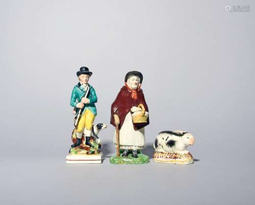 Three Staffordshire figures c.1820-30, one of a rabbit, anot...