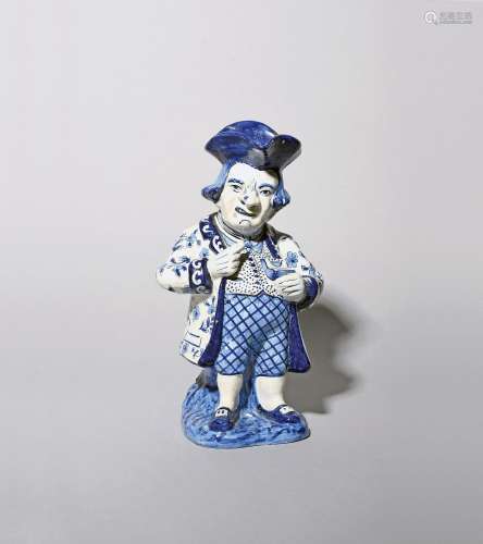 A Delft snuff-taking Toby jug 19th/early 20th century, stand...