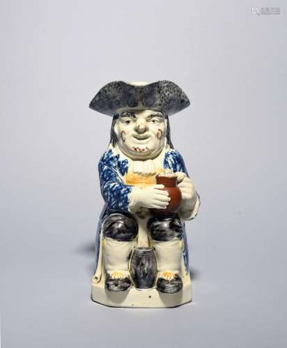 A good Wood type Toby jug c.1790-1800, seated with an uprigh...