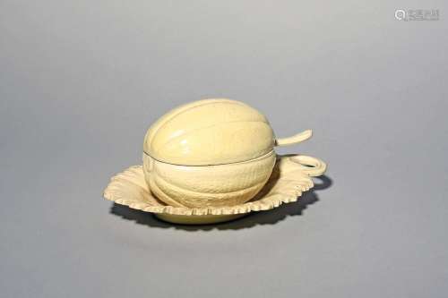 A creamware melon tureen with cover and ladle late 18th/earl...