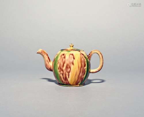 A small Whieldon type creamware teapot and cover c.1780, the...