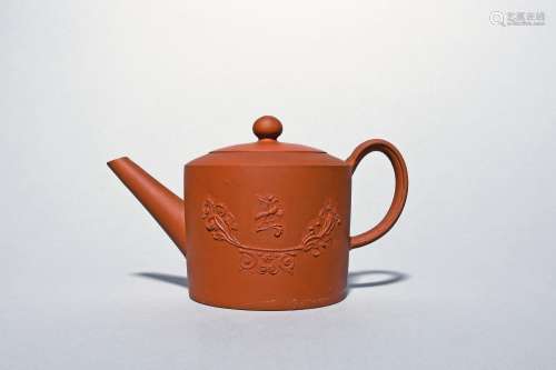 A Staffordshire red ware teapot and cover c.1760-70, the cyl...