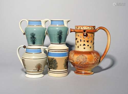 Three Mochaware jugs and a mug 19th/early 20th century, two ...