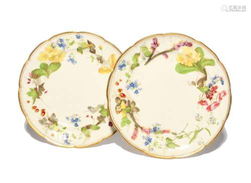 A pair of Nantgarw plates c.1818-20, painted in the manner o...