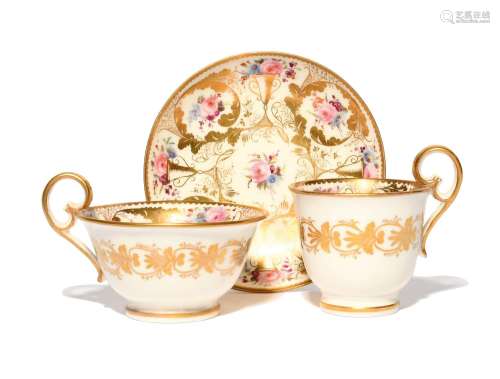 A Nantgarw trio c.1815-18, comprising a teacup, a coffee cup...