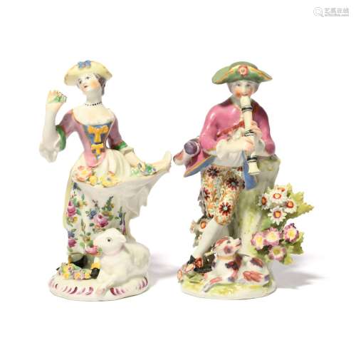 A matched pair of Bow figures of a piping shepherd and his c...