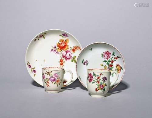 A Lowestoft coffee cup and saucer c.1770, painted with spray...