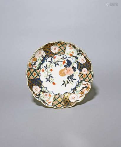 A rare Chelsea dessert plate c.1752-58, richly decorated in ...