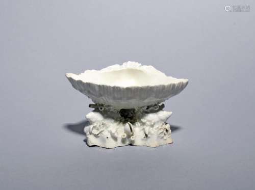 A Bow white-glazed shell salt c.1755, formed as a large shel...