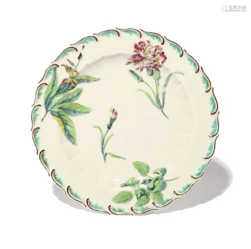 A Chelsea botanical plate c.1756, painted with a carnation s...