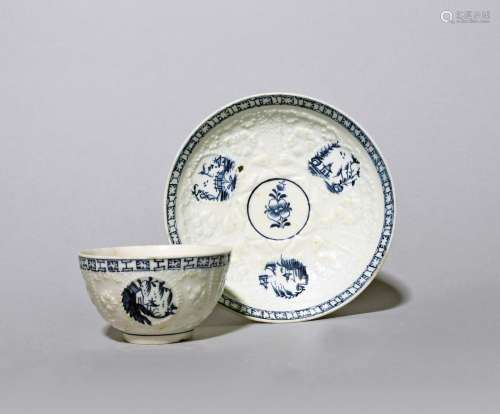 A Lowestoft blue and white teabowl and saucer c.1762-65, of ...