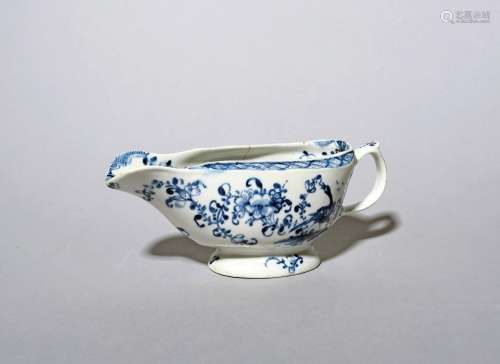 A rare Lowestoft blue and white sauceboat c.1764-66, of narr...