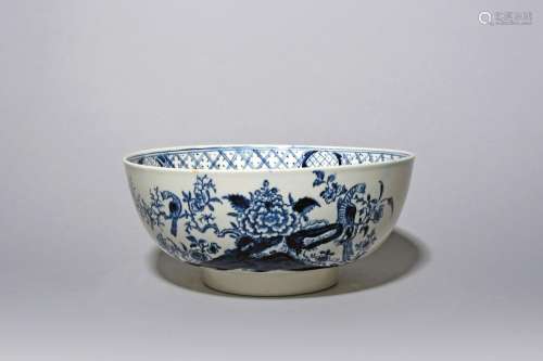 A Lowestoft blue and white punchbowl c.1765-70, decorated wi...