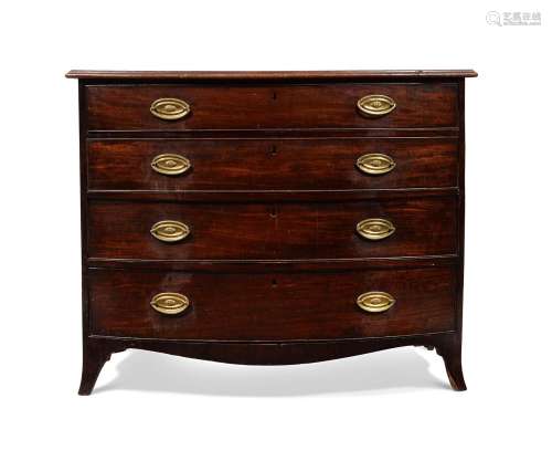 A GEORGE III MAHOGANY BOWFRONT CHEST OF DRAWERS OR COMMODE
