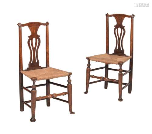A PAIR OF GEORGE III ELM AND RUSH SEATED SIDE CHAIRS