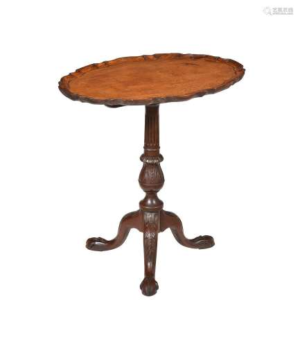 A MAHOGANY OVAL TRIPOD TABLE IN GEORGE III STYLE