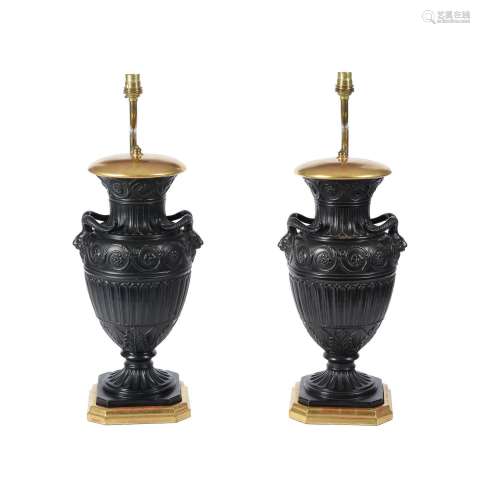 A PAIR OF CONTINENTAL COLD PAINTED TERRACOTTA URNS IN 18TH C...