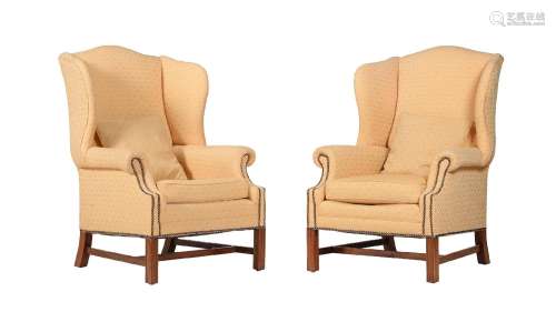 A PAIR OF MAHOGANY AND YELLOW UPHOLSTERED ARMCHAIRS IN GEORG...