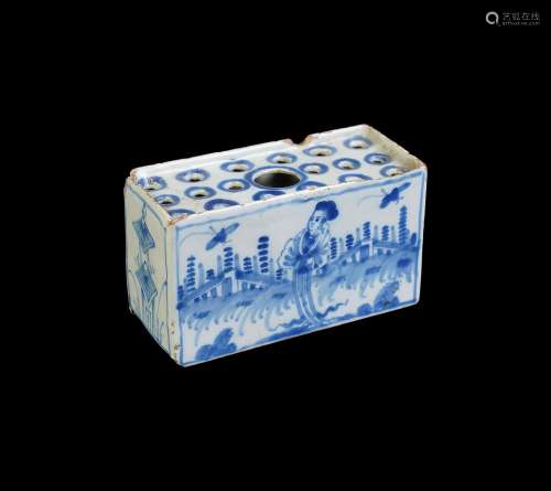 AN ENGLISH DELFT CHINOISERIE BLUE AND WHITE FLOWER BRICK