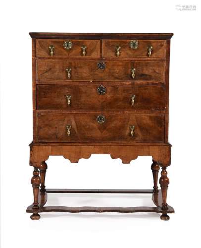 A GEORGE II WALNUT CHEST ON STAND