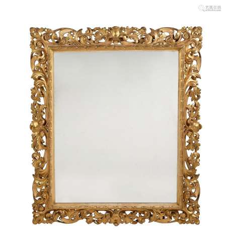 A GILTWOOD WALL MIRROR