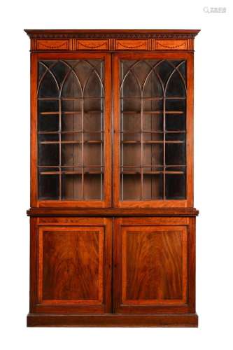 A GEORGE III MAHOGANY, SATINWOOD AND MARQUETRY BOOKCASE