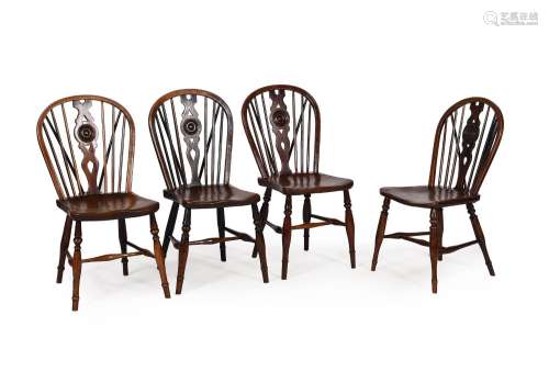 A HARLEQUIN SET OF FOUR ELM, ASH, AND FRUITWOOD WINDSOR ARMC...