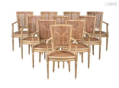 A SET OF TEN PAINTED WOOD DINING CHAIRS IN FRENCH TRANSITION...