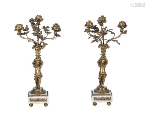 A PAIR OF GILT METAL AND MARBLE TABLE LAMPS