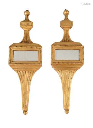 A PAIR OF GILTWOOD AND MIRRORED WALL ORNAMENTS IN GEORGE III...