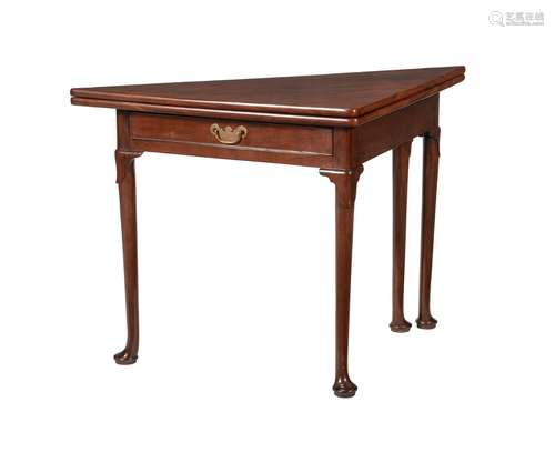 A GEORGE II MAHOGANY TRIANGULAR FOLDING TEA TABLE